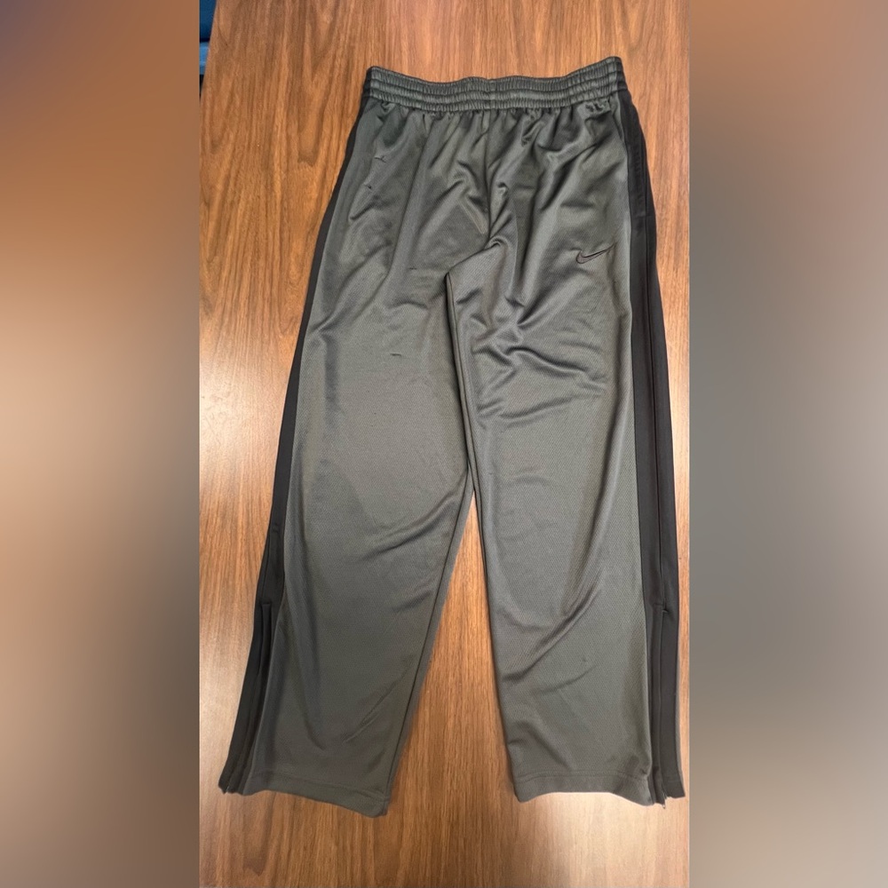 Men’s Nike Black Track Pants. Size L. Few snags in thigh. See pics.